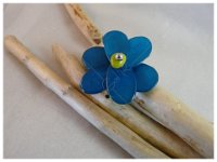 2. Bague fleur en ivoire végétal (tagua) tour de doigt en cuir rond 15€