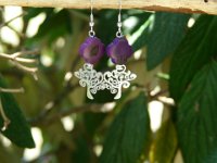 28.Bo crochet trefle en tagua violet et arbre de vie en acier inoxidable.12€.