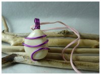 92.pendentif graine tagua naturelle fil alu 18€