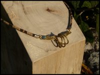 4.Collier ras de cou en liège et tourbillon en or végétal, 28€