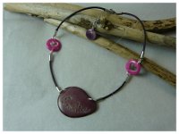 6.découpe prénom dans graine de tagua sur collier