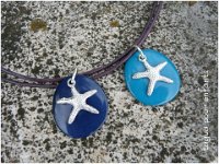 5.collier étoile de mer sur graine de tagua montée sur cordon cuir violine.18€
